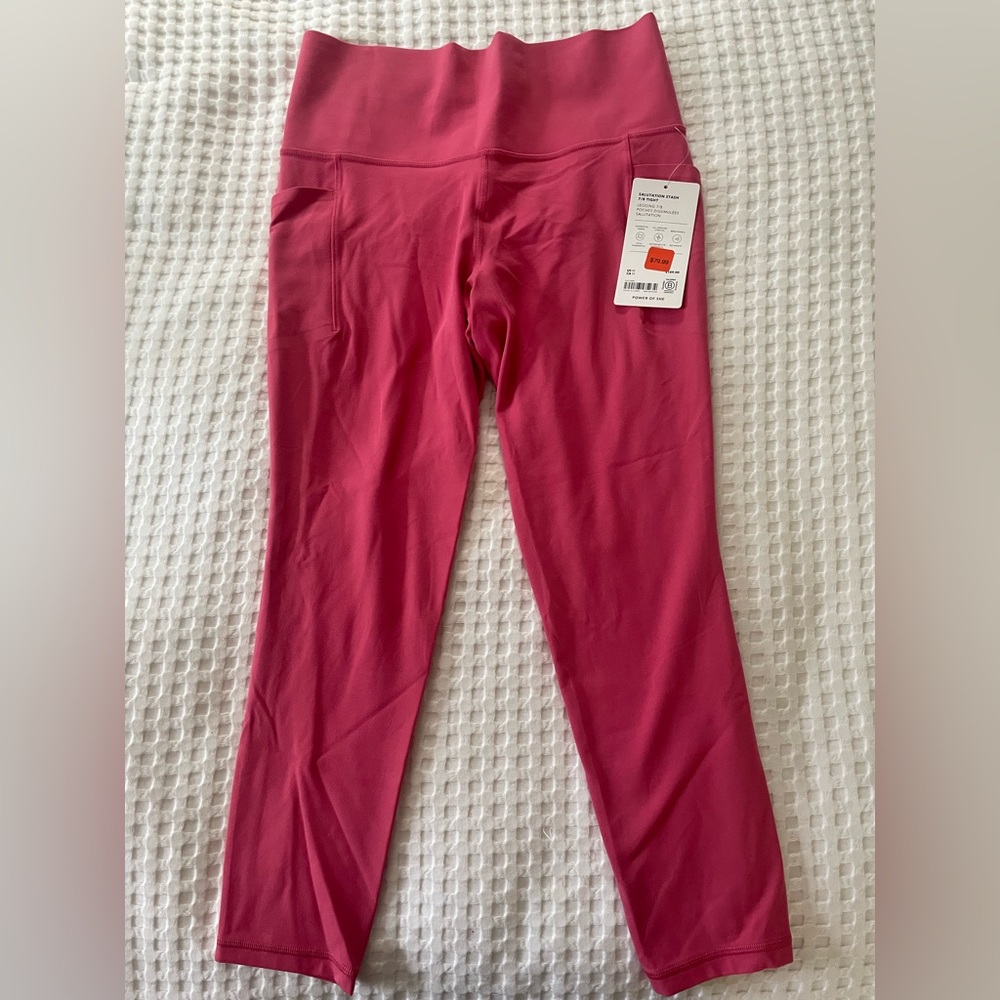 NWT Athleta size M Salutation Stash 7/8 Tight NWT